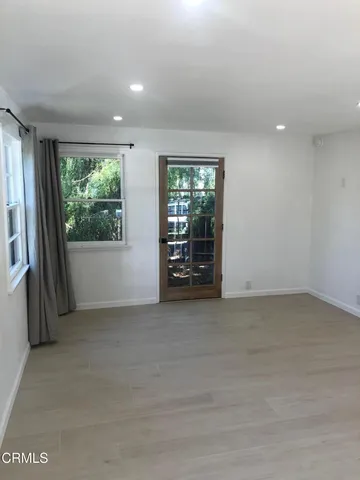 a kitchen with a sink and a window