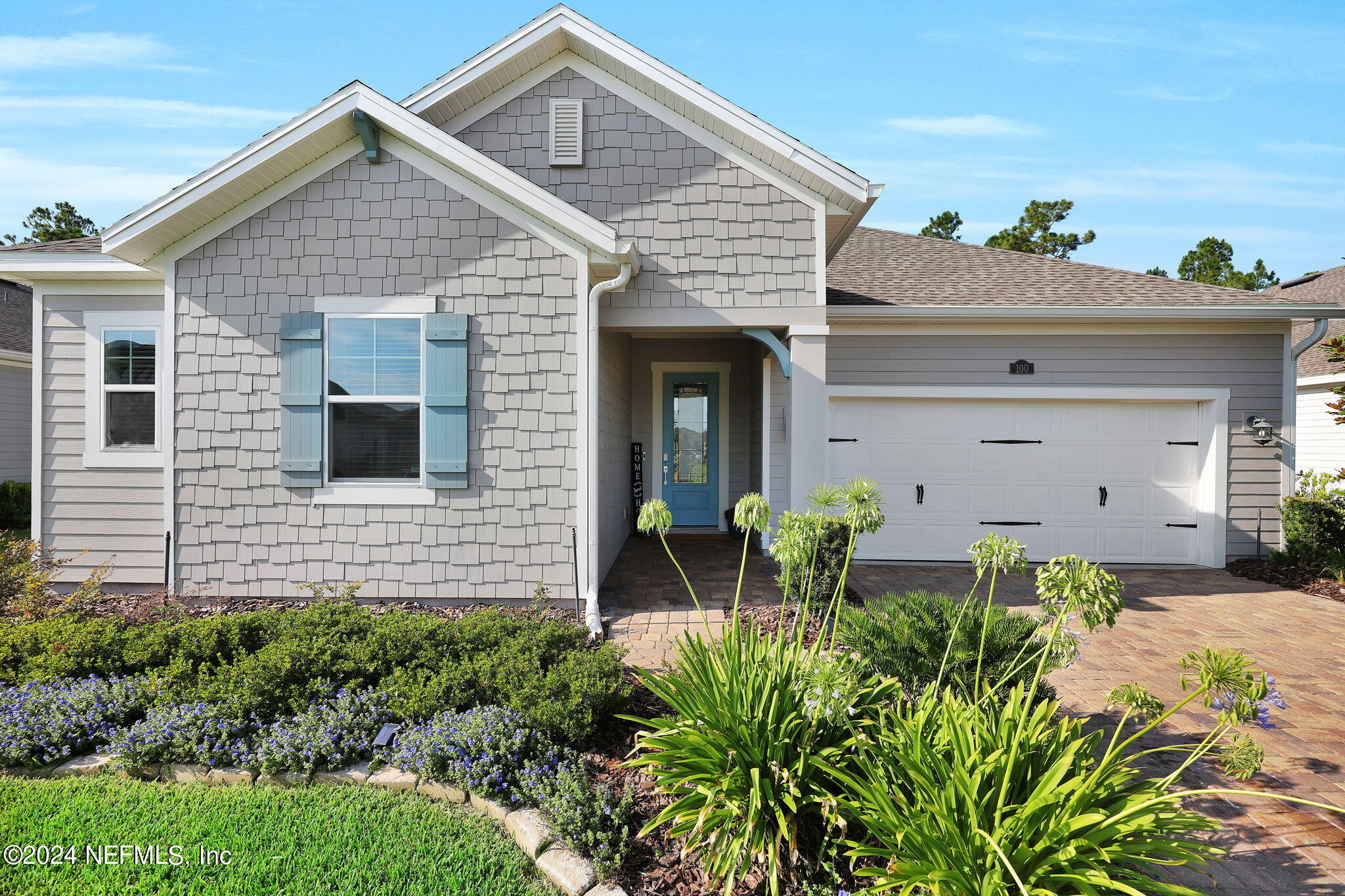 a view of house with chair and tables