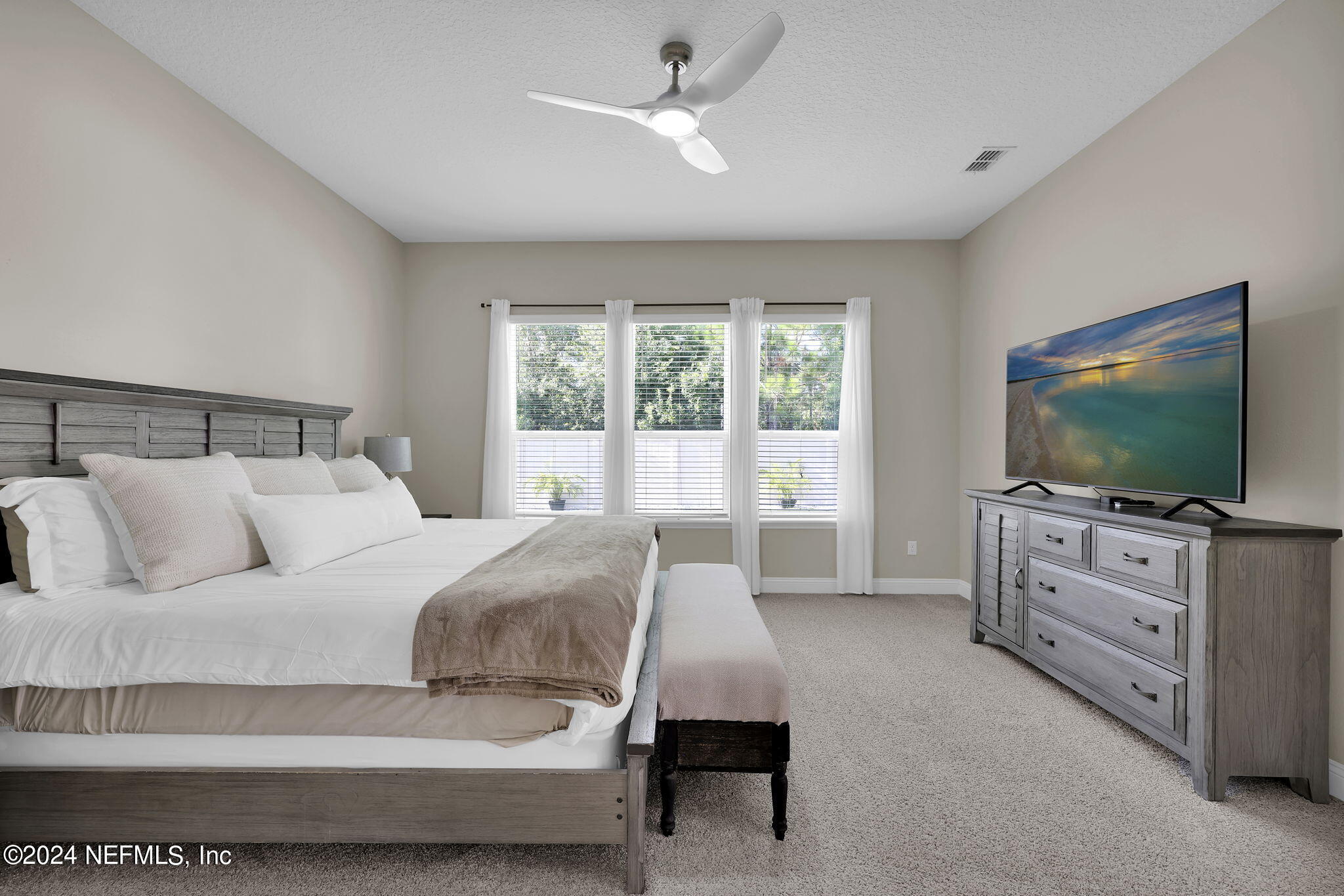 100 Calliel Way St. Johns, FL 32259 - Photo 12 of 50 a bedroom with bed and flat screen tv