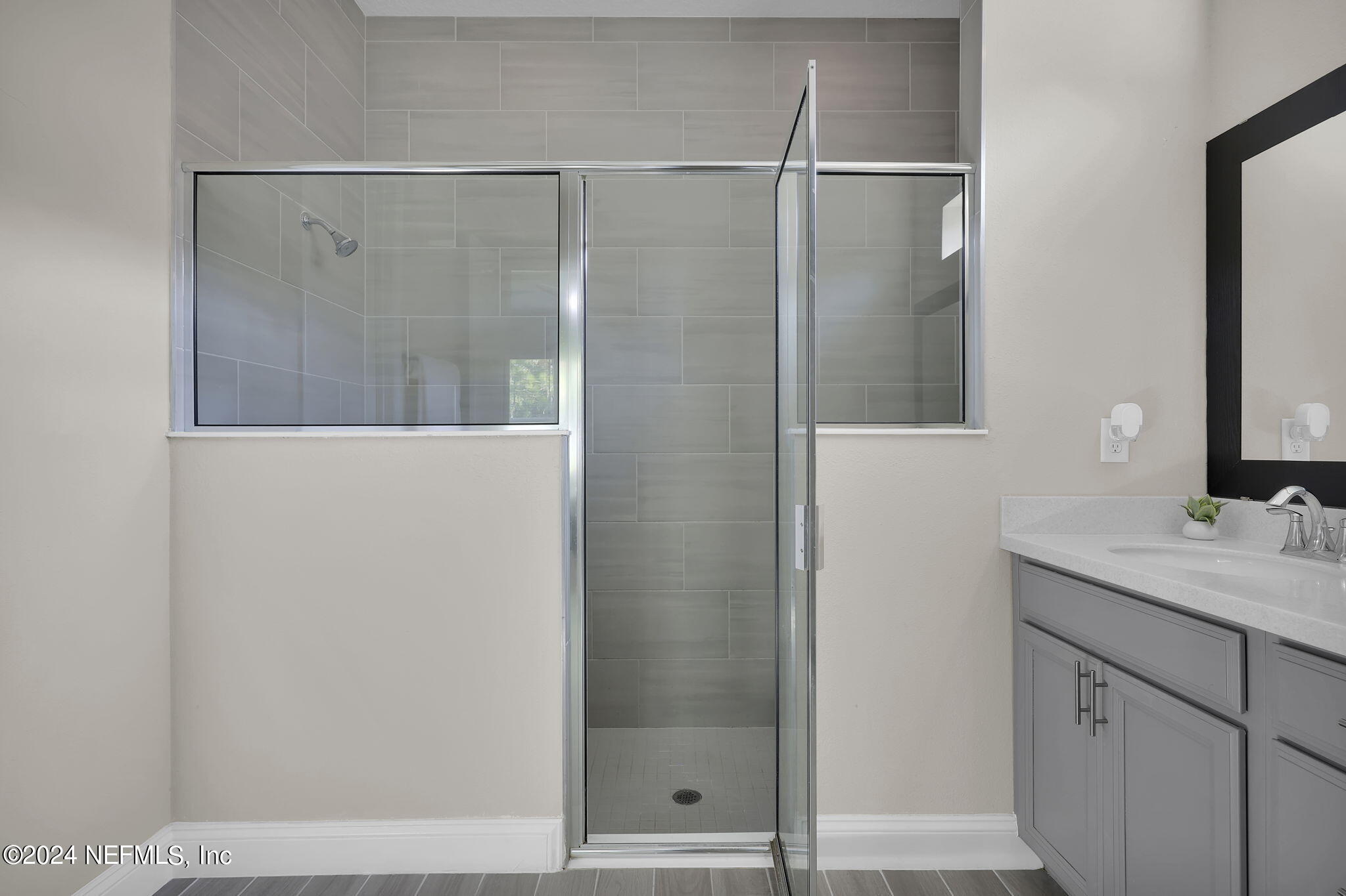 100 Calliel Way St. Johns, FL 32259 - Photo 15 of 50 a bathroom with a shower and a sink