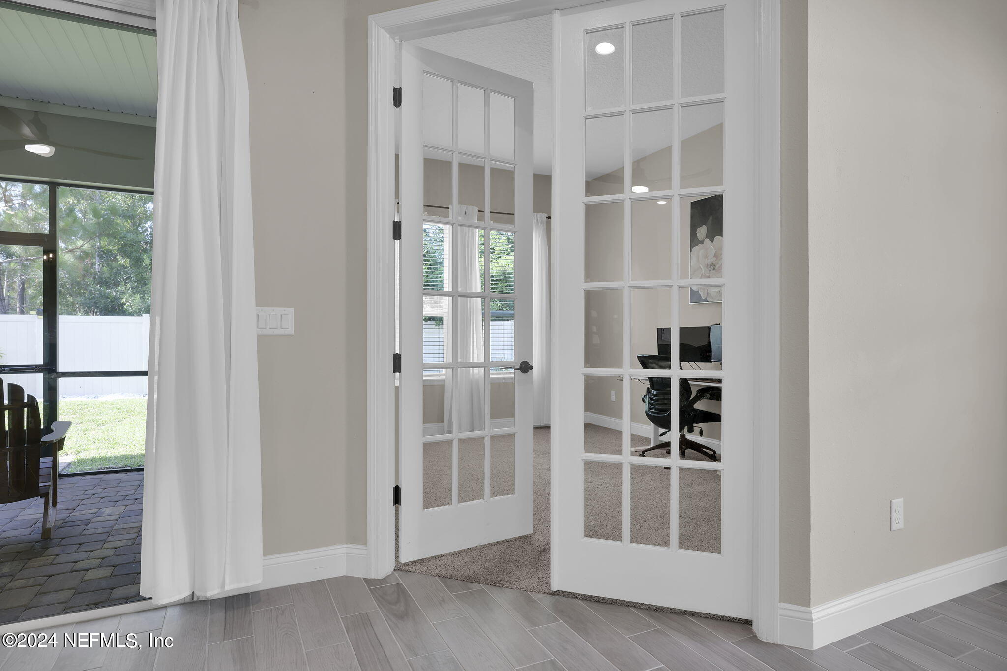 100 Calliel Way St. Johns, FL 32259 - Photo 16 of 50 an empty room with wooden floor and windows