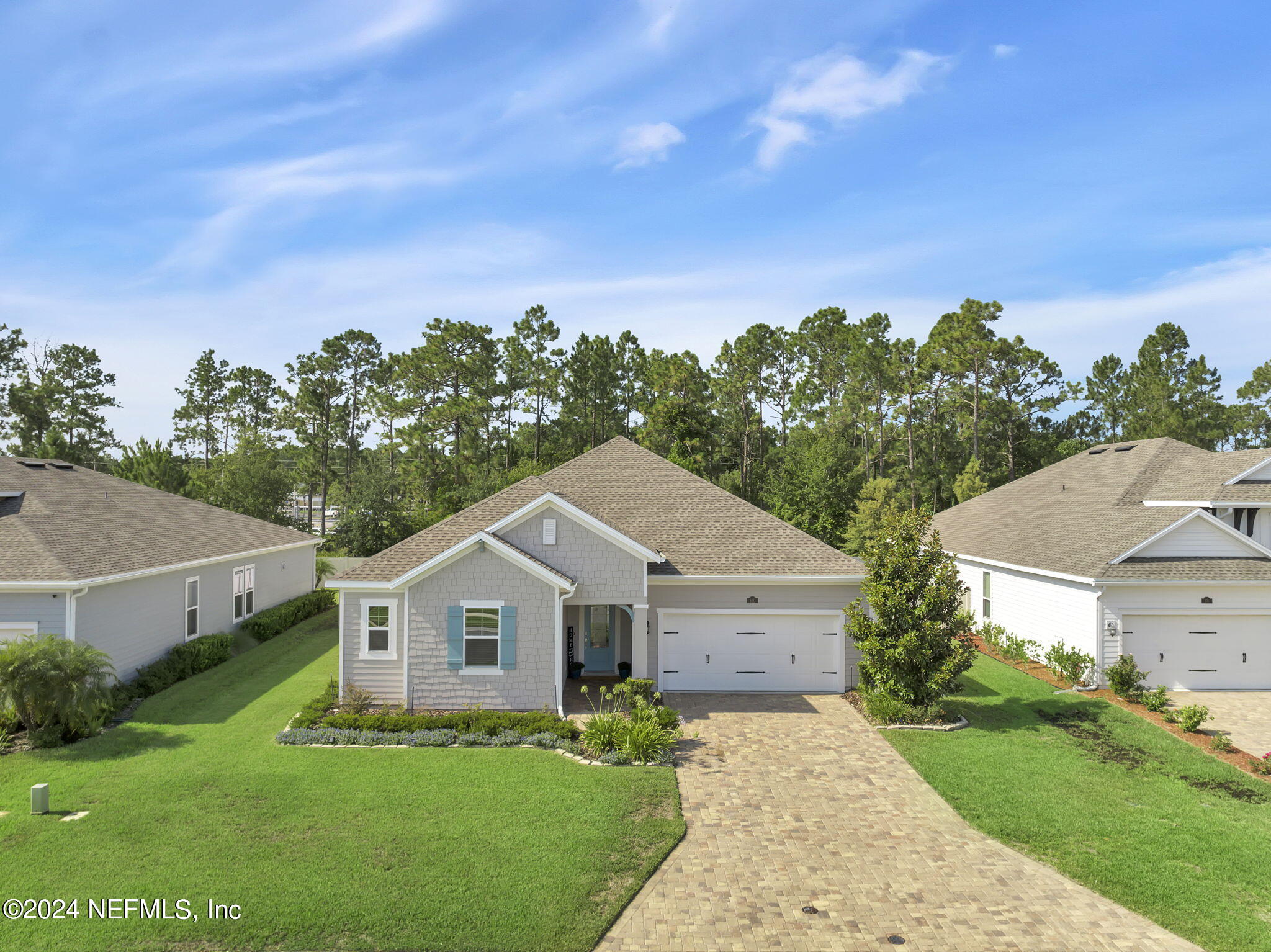 100 Calliel Way St. Johns, FL 32259 - Photo 2 of 50 a front view of a house with a yard