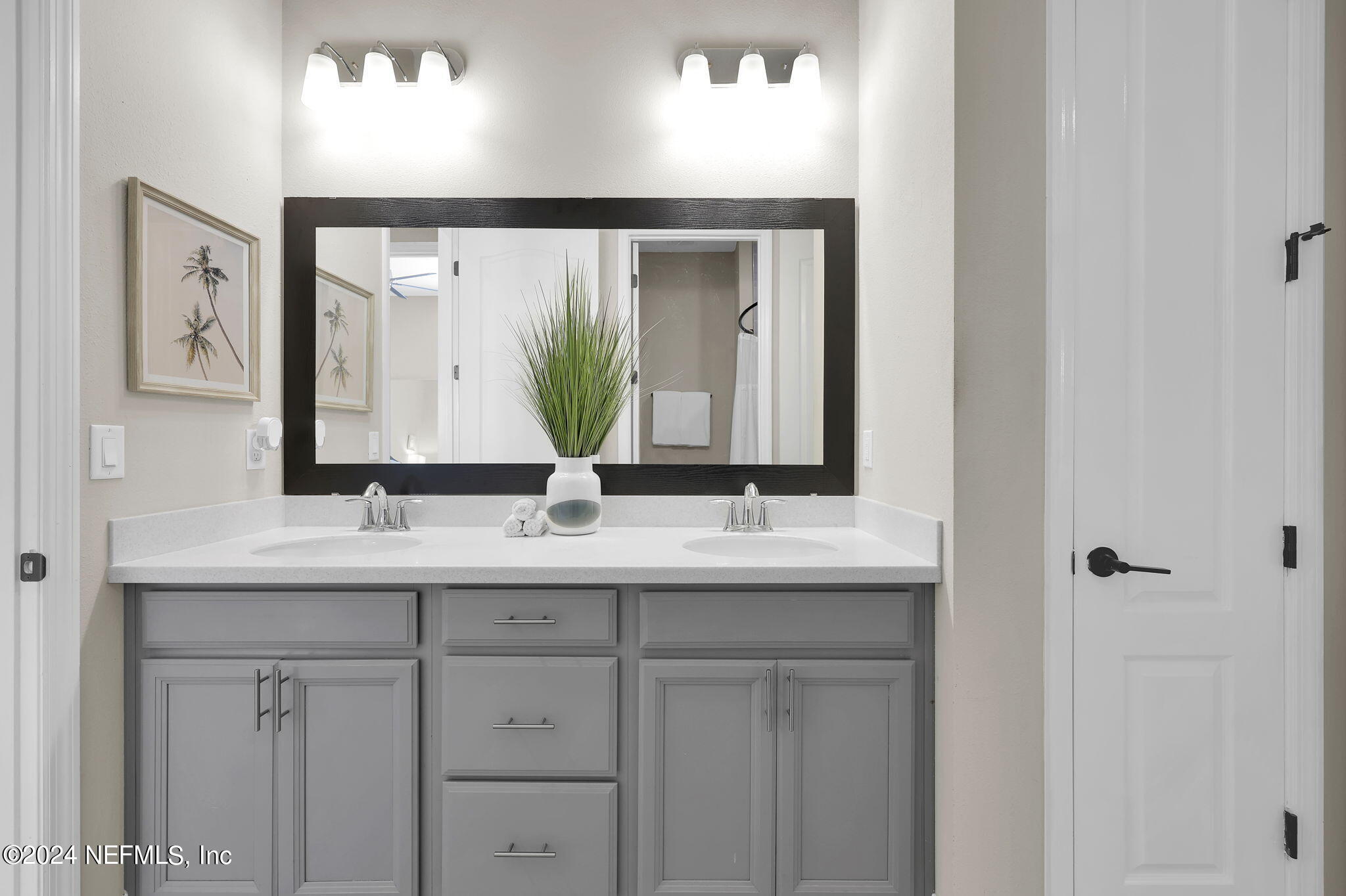 100 Calliel Way St. Johns, FL 32259 - Photo 22 of 50 a bathroom with 2 sink and a mirror