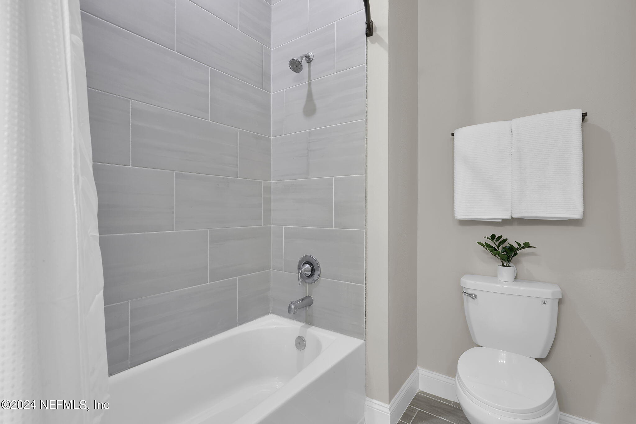 100 Calliel Way St. Johns, FL 32259 - Photo 23 of 50 a white toilet sitting next to a bath tub