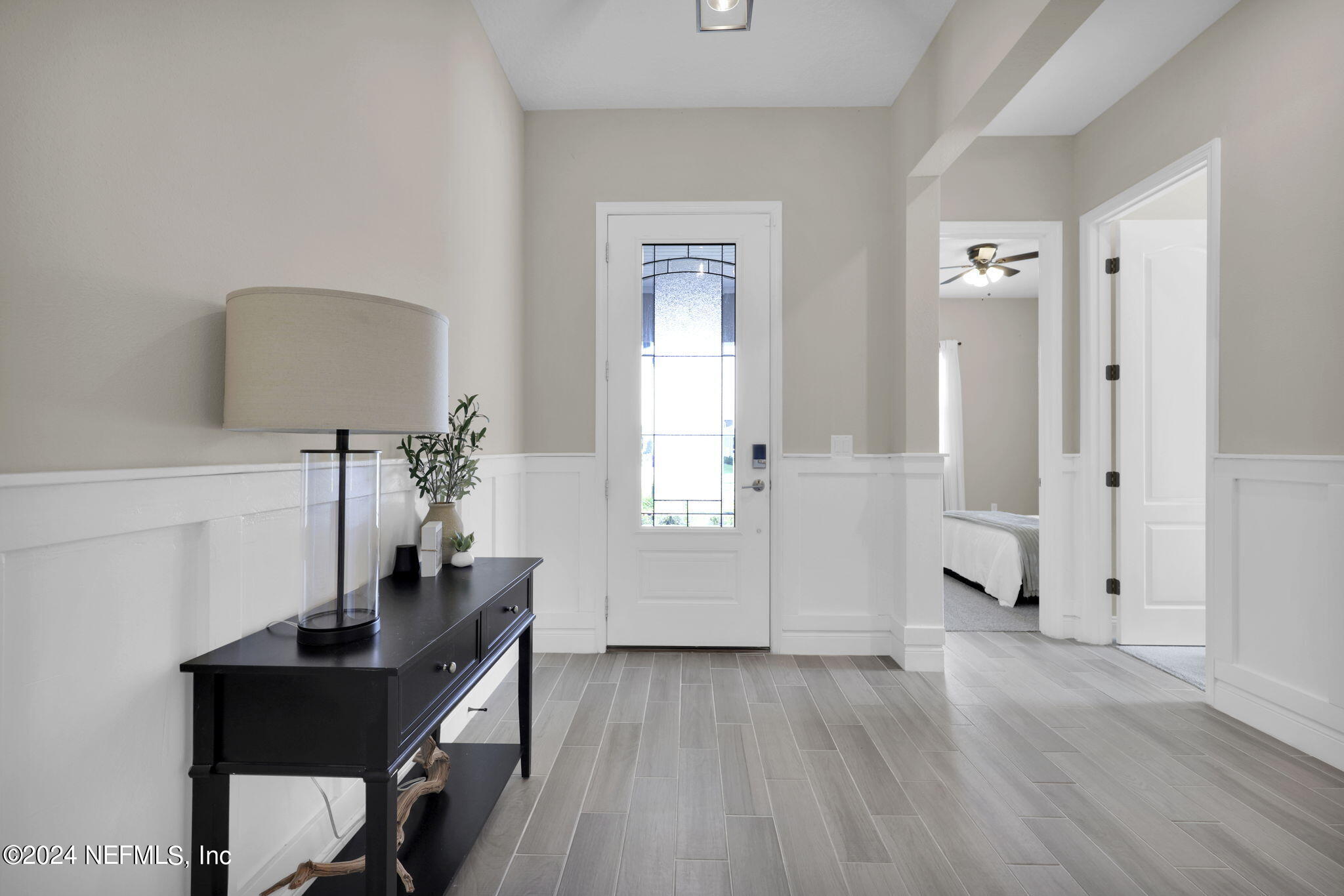 100 Calliel Way St. Johns, FL 32259 - Photo 3 of 50 a view of a workspace with furniture and wooden floor