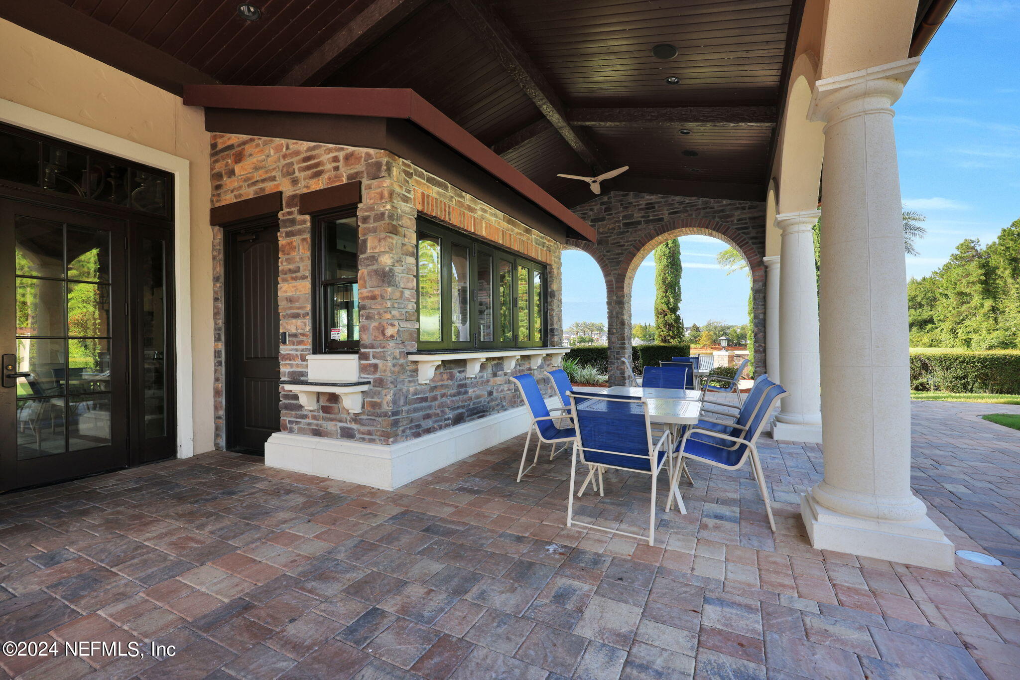 100 Calliel Way St. Johns, FL 32259 - Photo 38 of 50 a view of a porch with dining table and chairs