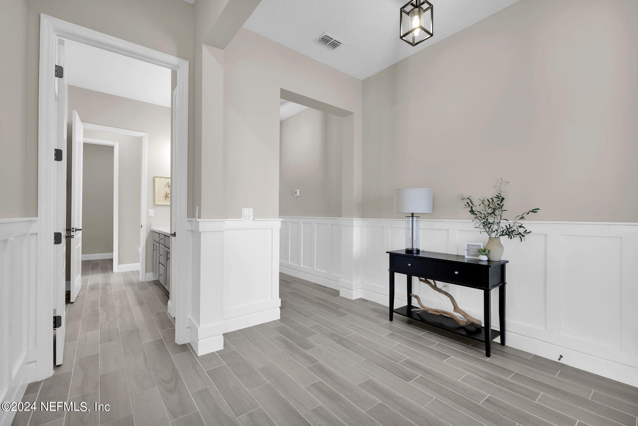 100 Calliel Way St. Johns, FL 32259 - Photo 4 of 50 a view of a room with wooden floor and furniture