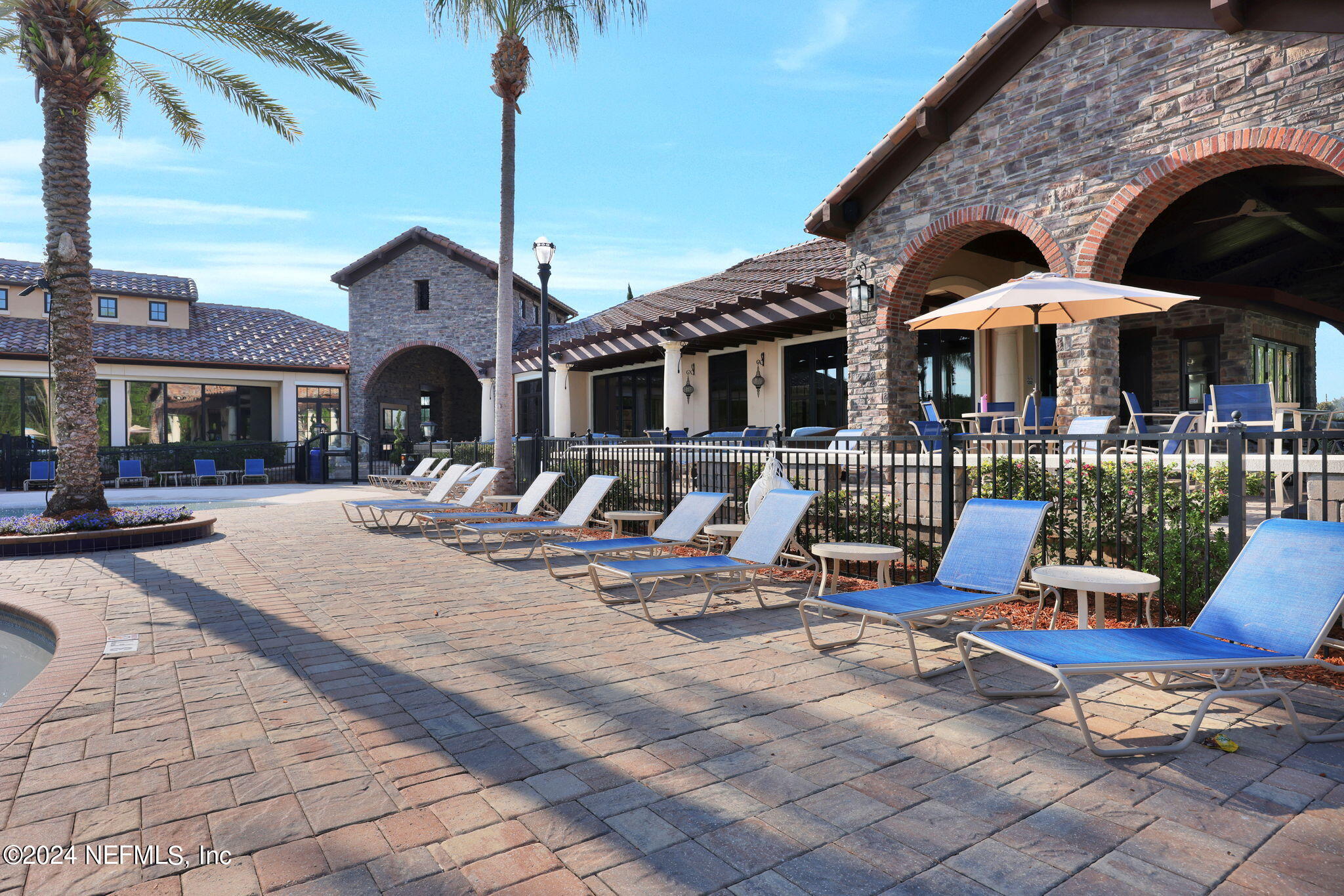 100 Calliel Way St. Johns, FL 32259 - Photo 39 of 50 a view of a patio with a table chairs and a fire pit