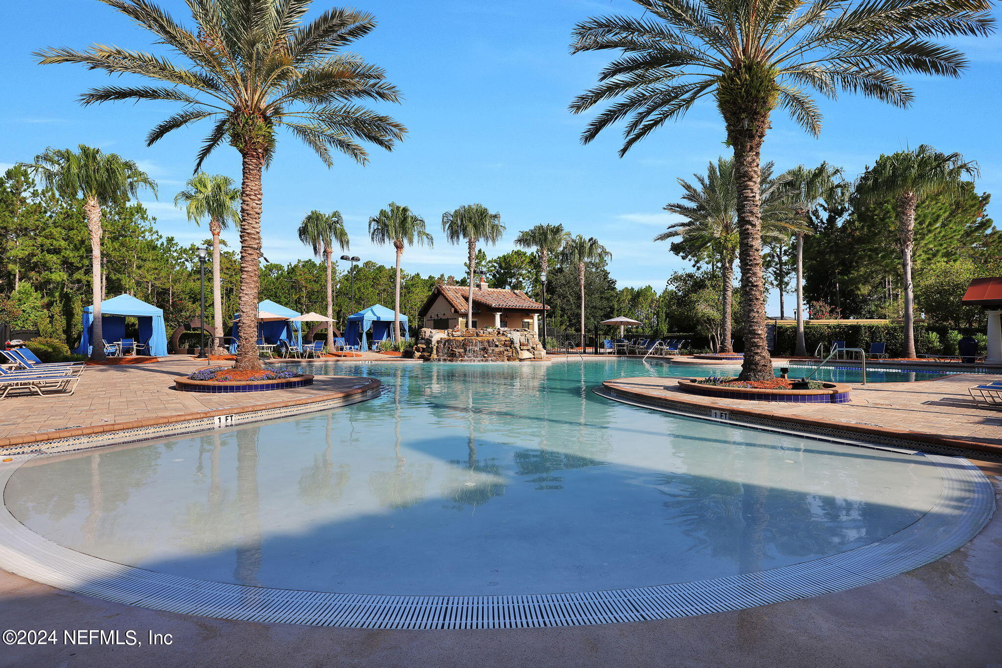 100 Calliel Way St. Johns, FL 32259 - Photo 42 of 50 a view of swimming pool with outdoor seating and palm tree