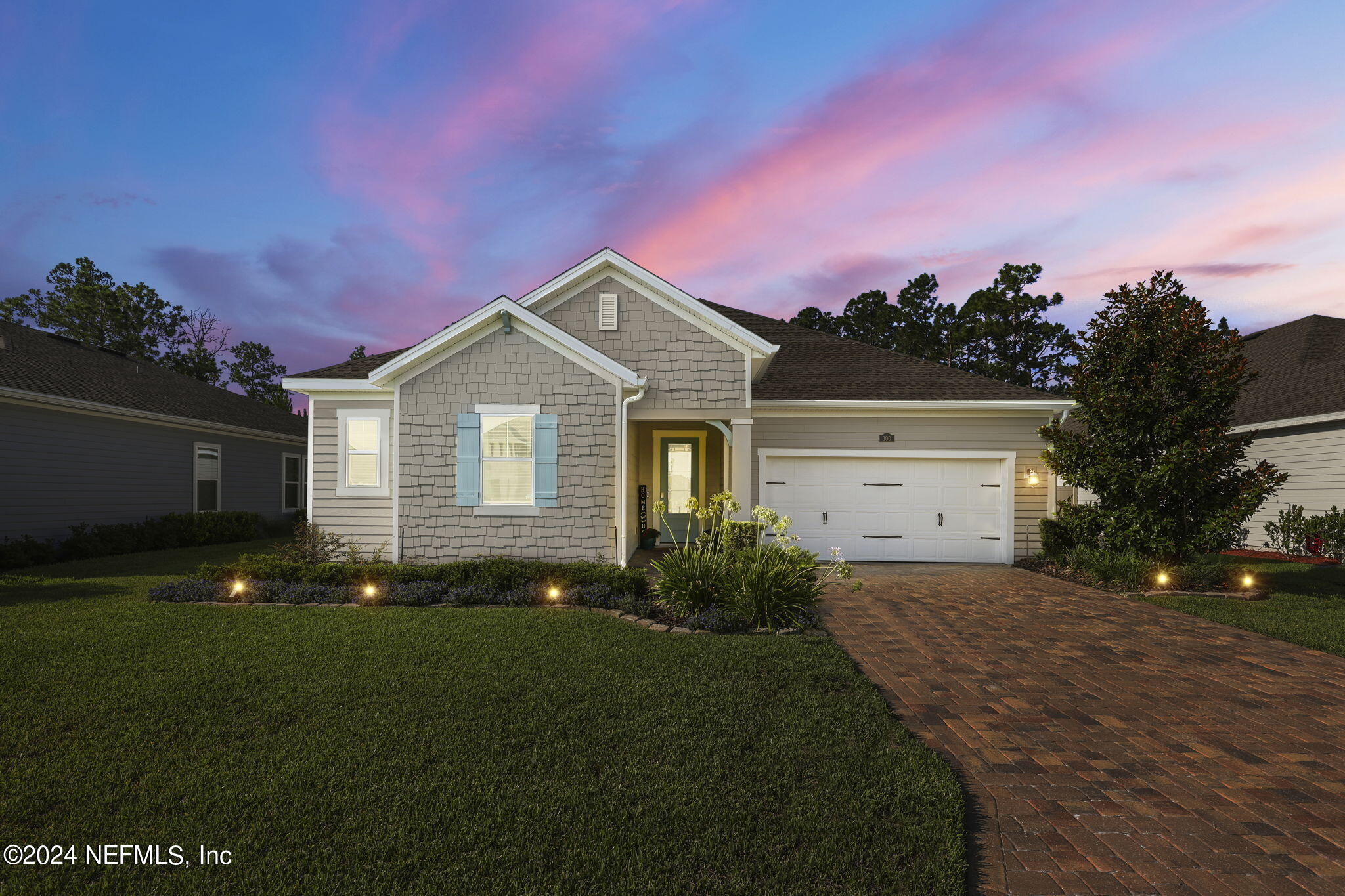 100 Calliel Way St. Johns, FL 32259 - Photo 47 of 50 a front view of a house with a garden and yard