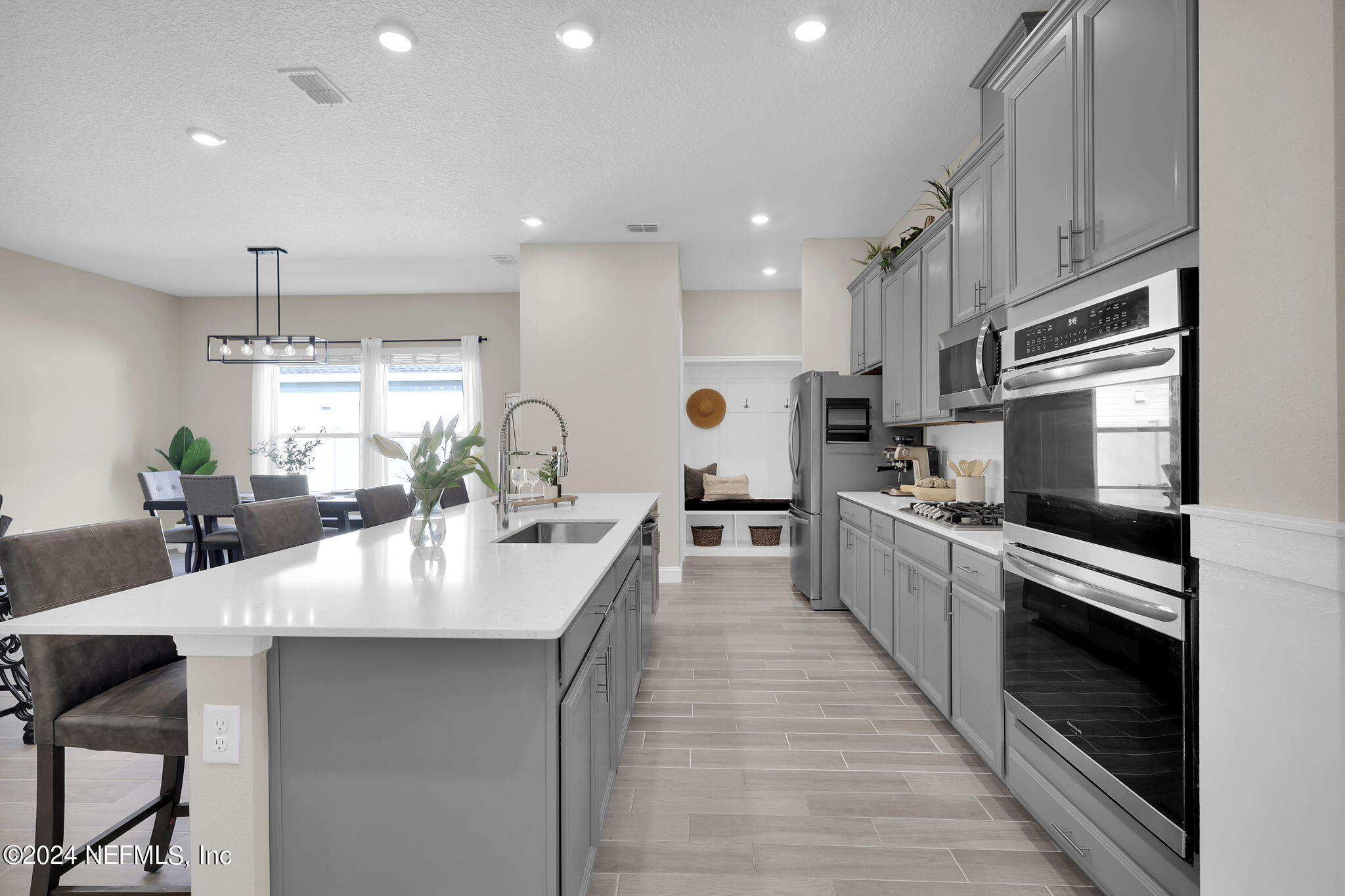 100 Calliel Way St. Johns, FL 32259 - Photo 8 of 50 a large kitchen with sink a counter space stainless steel appliances and cabinets