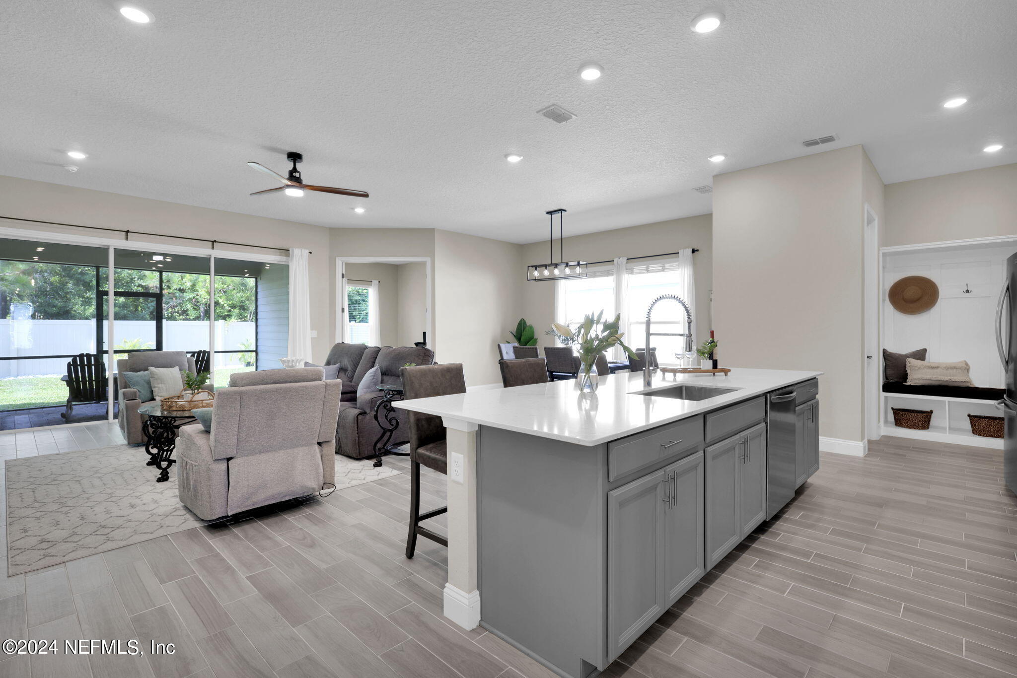 100 Calliel Way St. Johns, FL 32259 - Photo 49 of 50 a large white kitchen with a large window and furniture