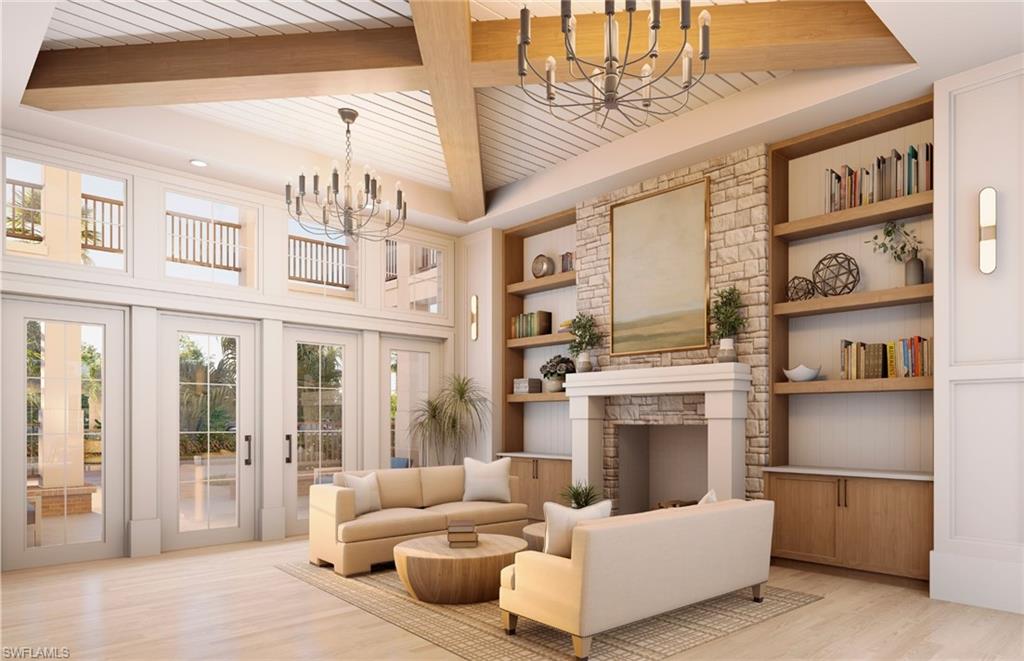 20039 Nickel Trail Alva, FL 33920 - Photo 36 of 50 a living room with furniture a fireplace and a chandelier