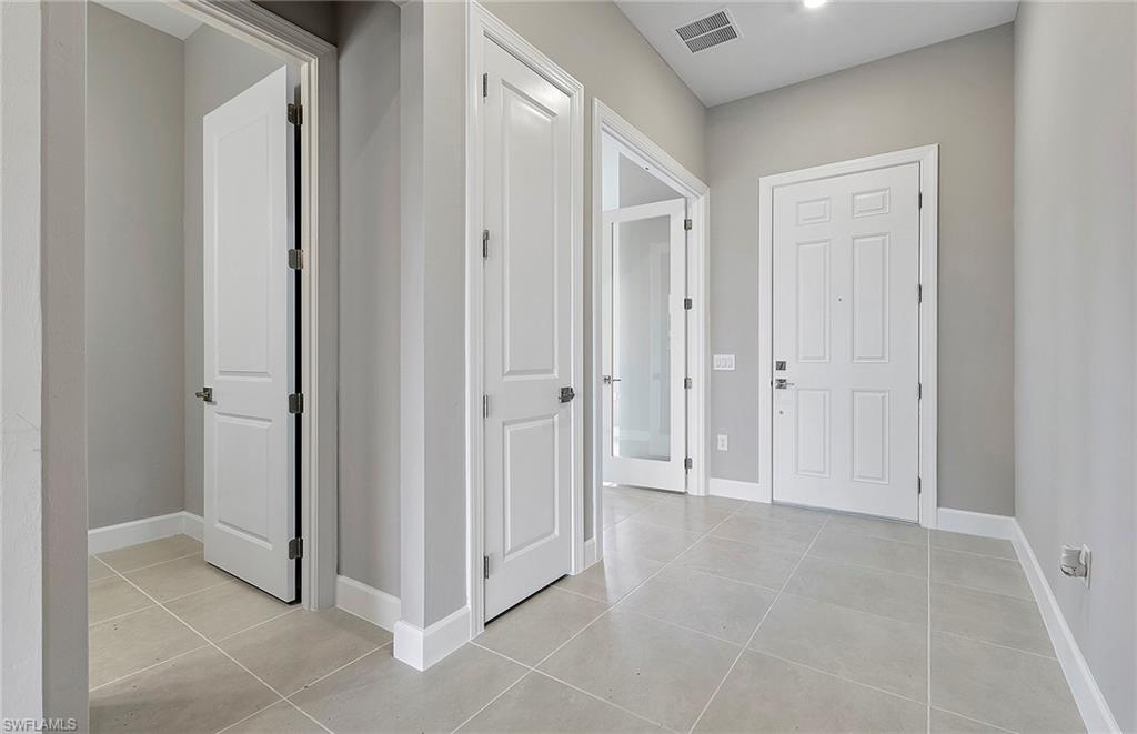 20039 Nickel Trail Alva, FL 33920 - Photo 8 of 50 a view of a hallway to rooms