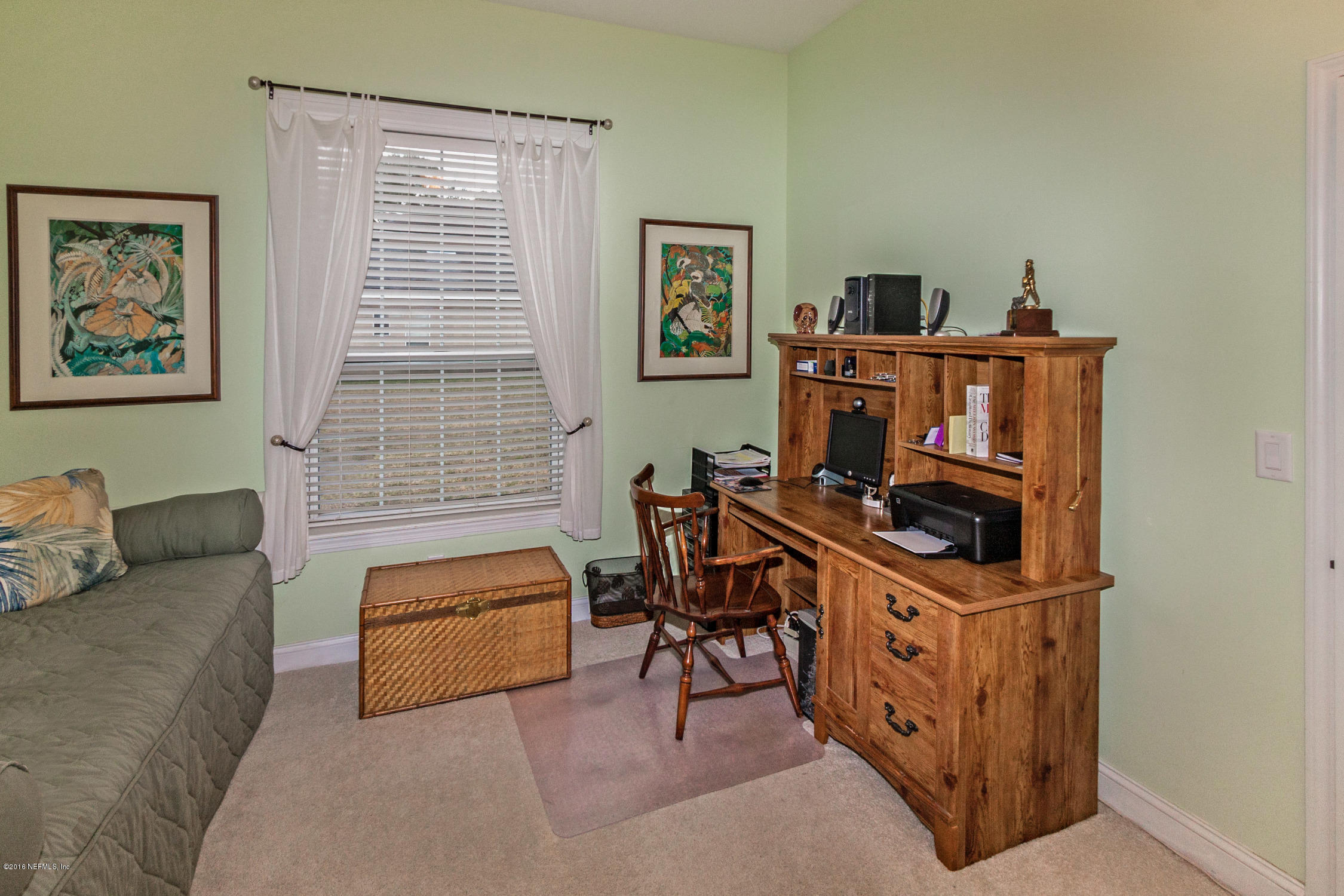 3357 Kings Road South St. Augustine, FL 32086 - Photo 19 of 31 a living room with furniture and a window