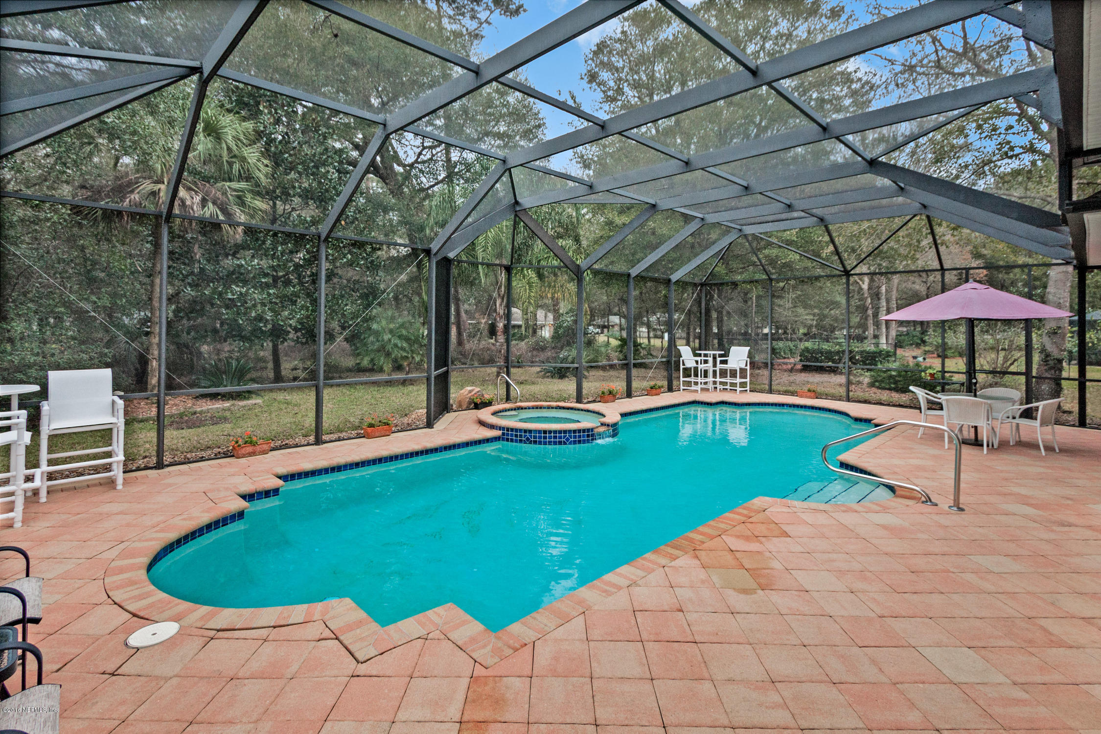 3357 Kings Road South St. Augustine, FL 32086 - Photo 30 of 31 a swimming pool with outdoor seating
