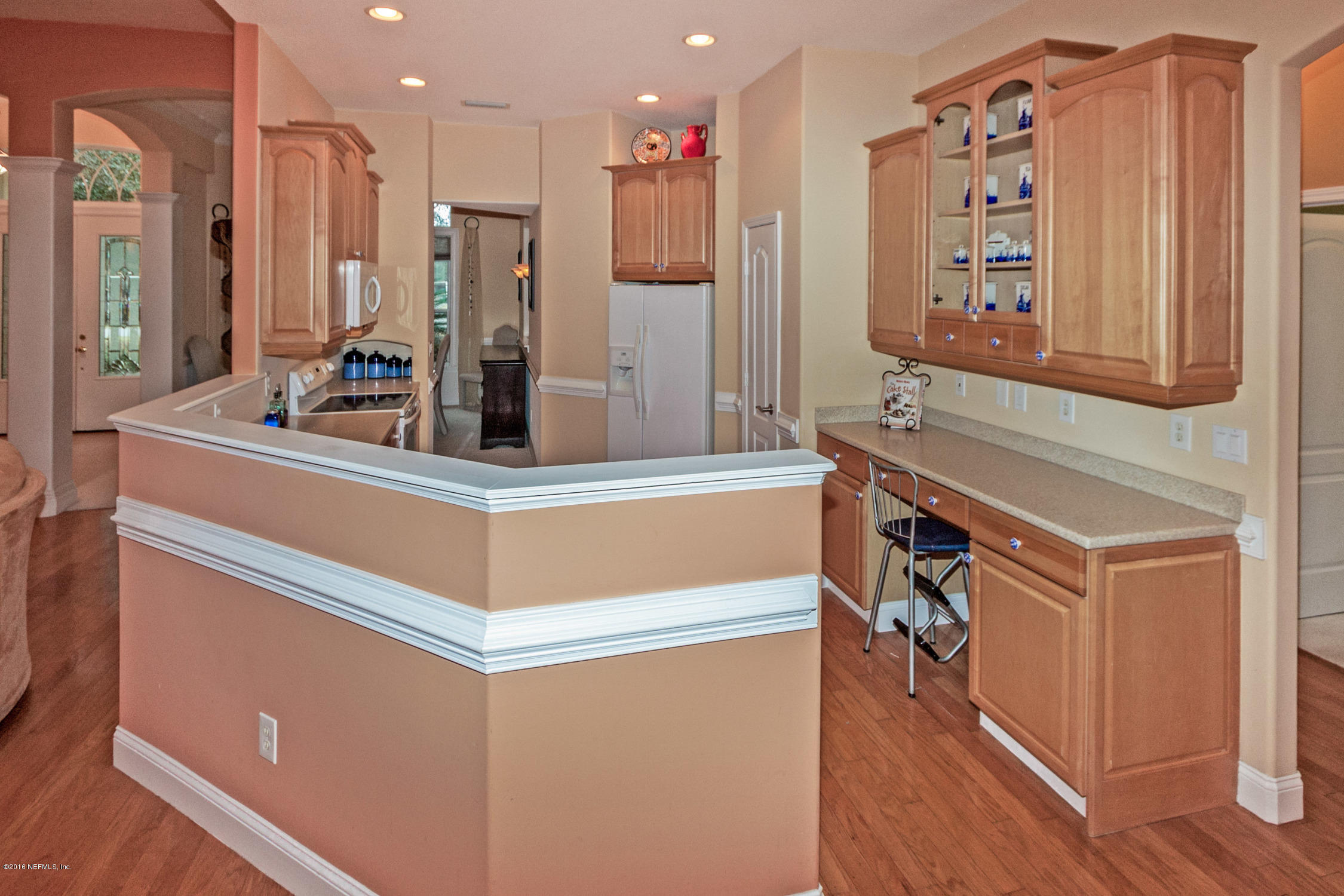 3357 Kings Road South St. Augustine, FL 32086 - Photo 10 of 31 a view of kitchen with cabinets and wooden floor
