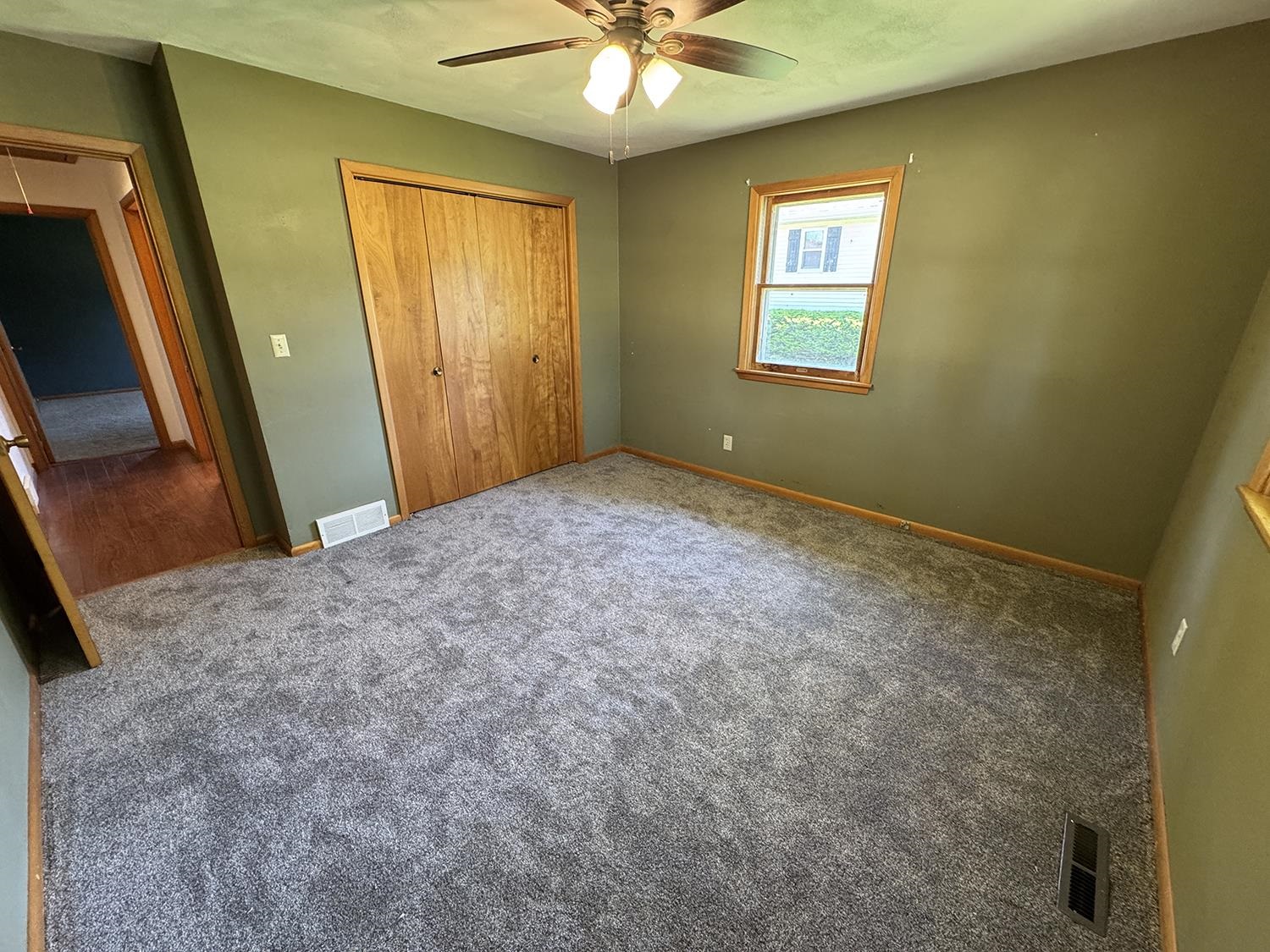 401 South Ridge Street Shannon, IL 61078 - Photo 25 of 40 a view of an empty room and a window