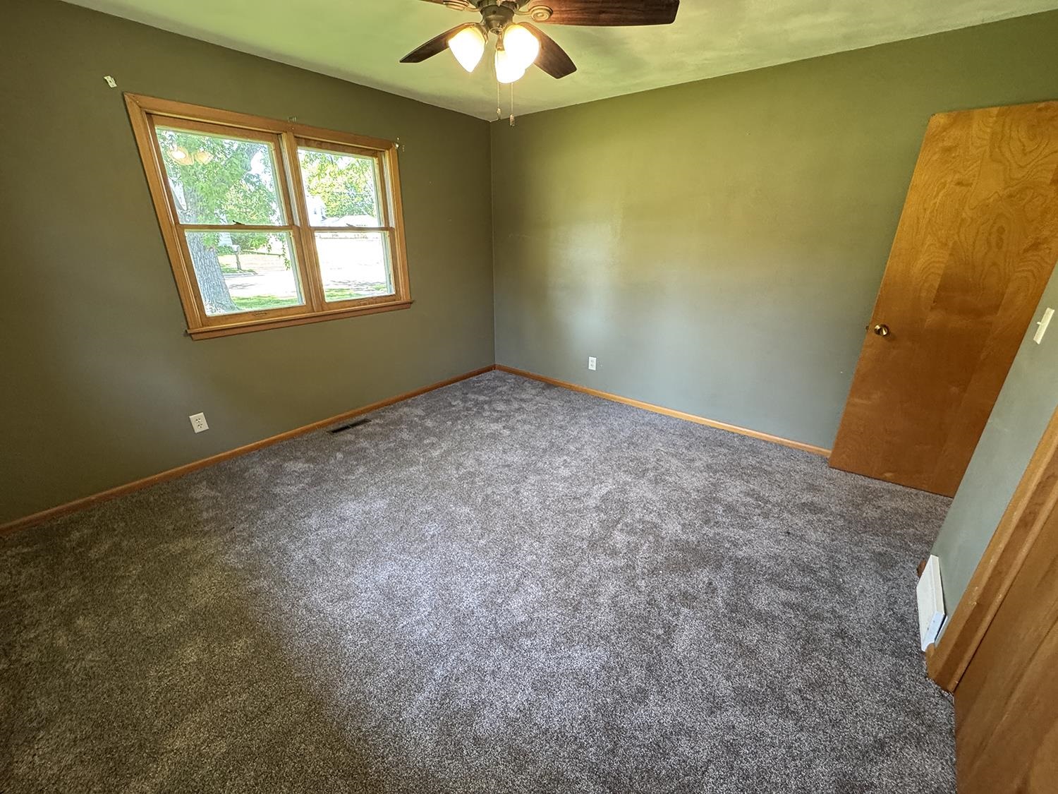 401 South Ridge Street Shannon, IL 61078 - Photo 27 of 40 a view of an empty room with a window
