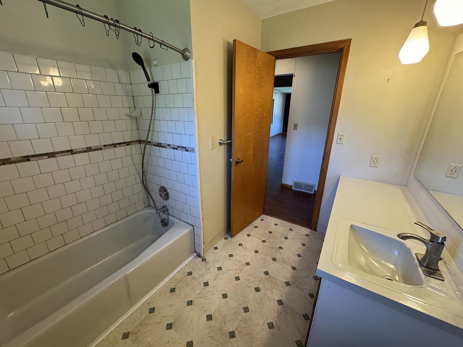 401 South Ridge Street Shannon, IL 61078 - Photo 29 of 40 a bathroom with a bathtub and shower
