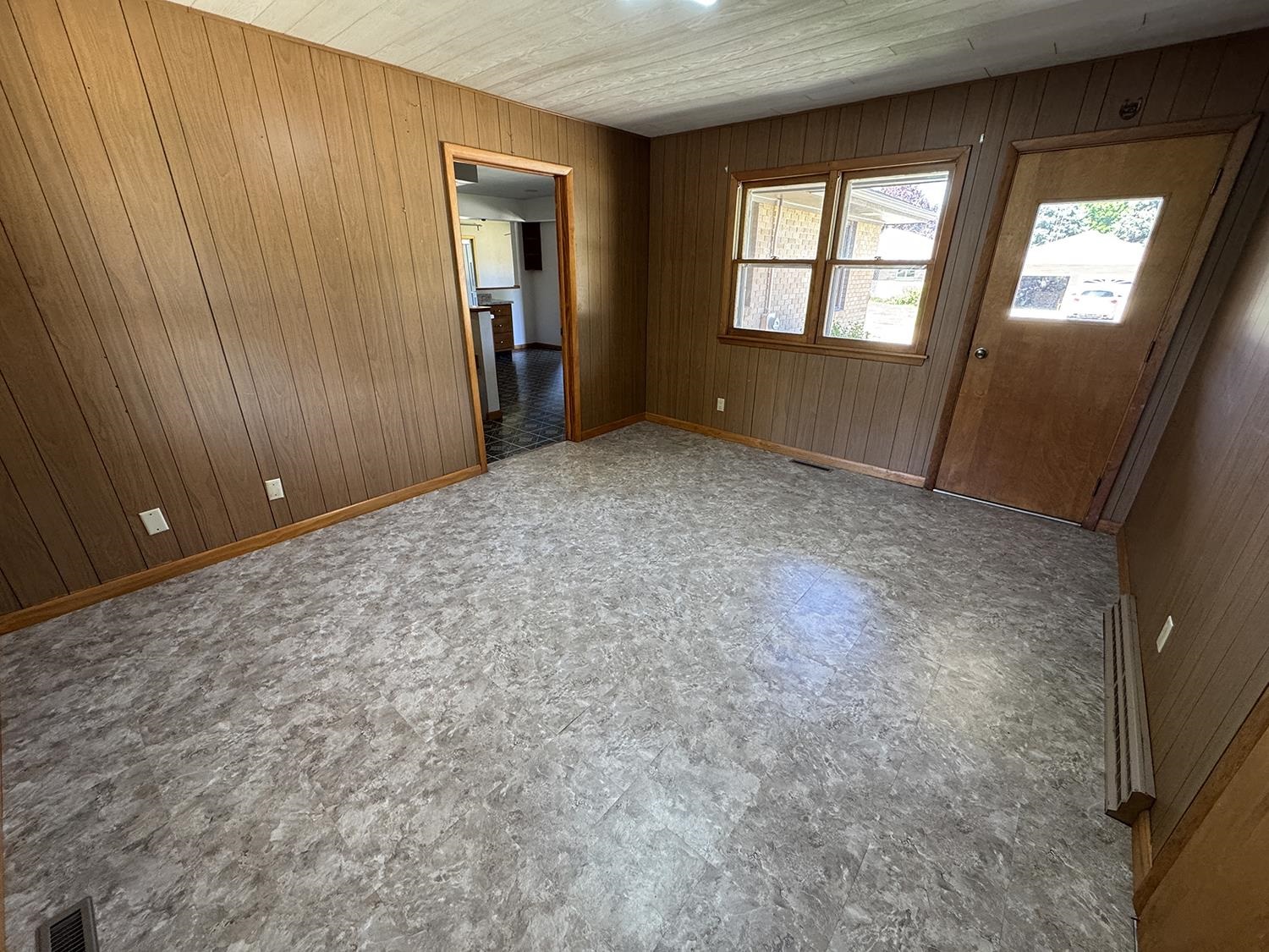 401 South Ridge Street Shannon, IL 61078 - Photo 32 of 40 an empty room with windows