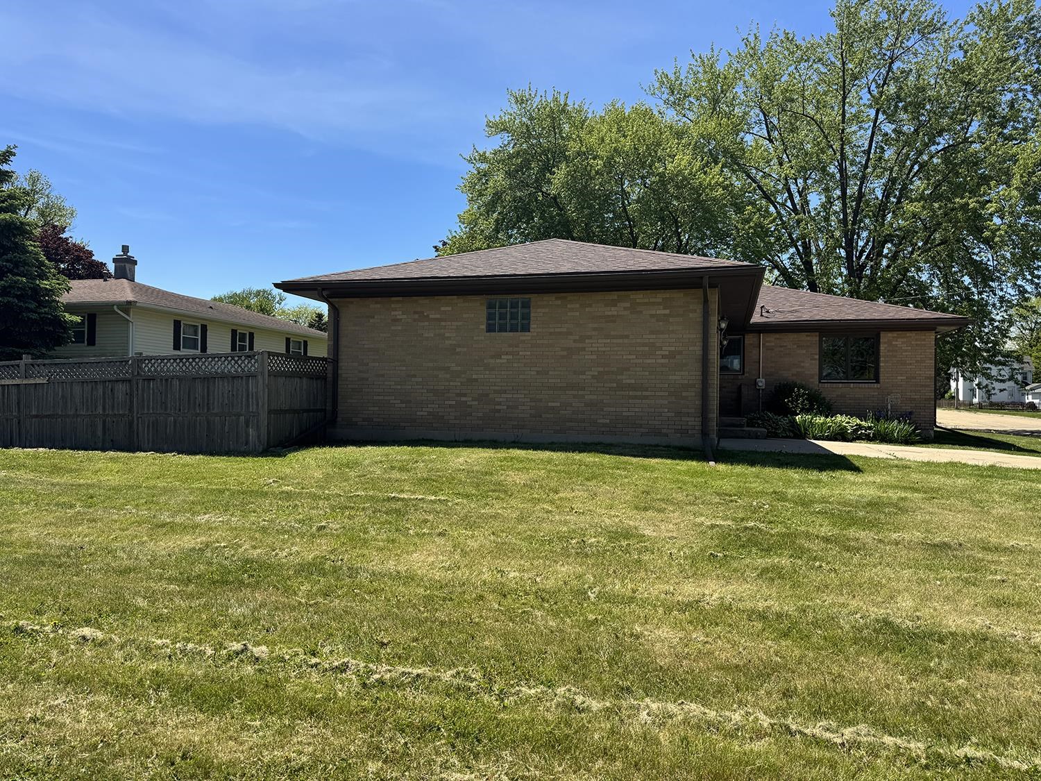 401 South Ridge Street Shannon, IL 61078 - Photo 6 of 40 a front view of a house with a yard