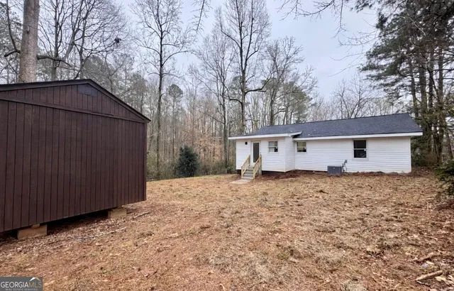 a house with trees in front of it