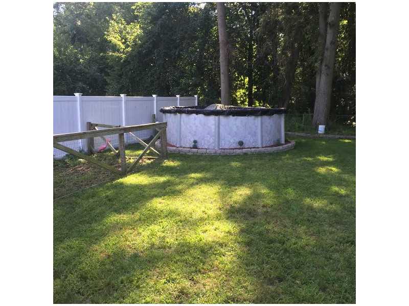 67 Tennyson Road Warwick, RI 02888 - Photo 24 of 25 Exterior Back. Salt water pool filter with a new liner
