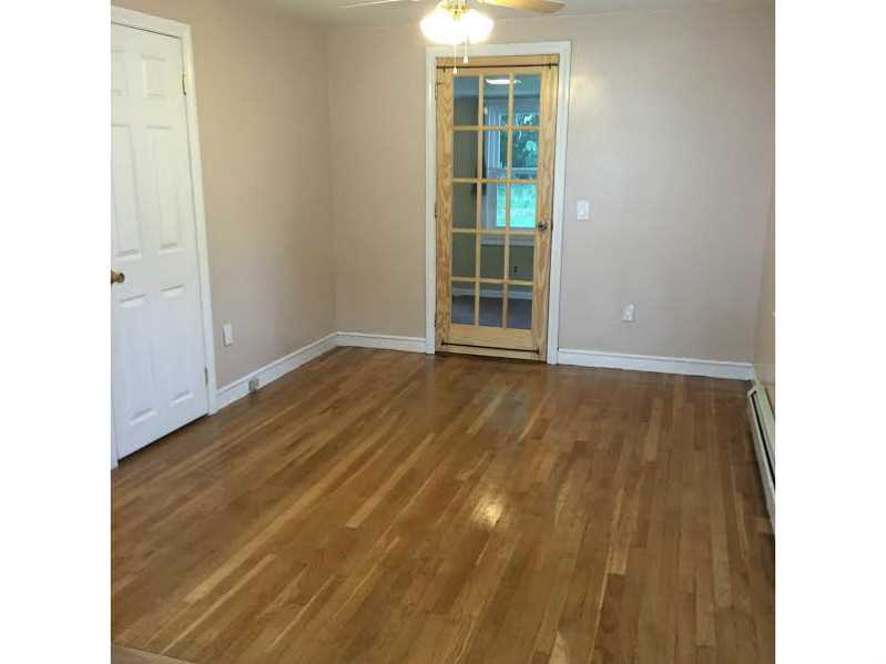 67 Tennyson Road Warwick, RI 02888 - Photo 8 of 25 Dining Room. Freshly finished hardwood floors