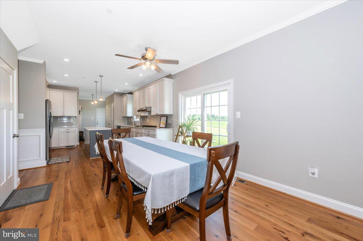 13226 Molasses Road Union Bridge, MD 21791 - Photo 14 of 78 a view of a dining room with furniture and wooden floor