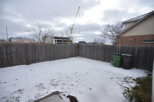 a kitchen with stainless steel appliances granite countertop a sink stove and microwave
