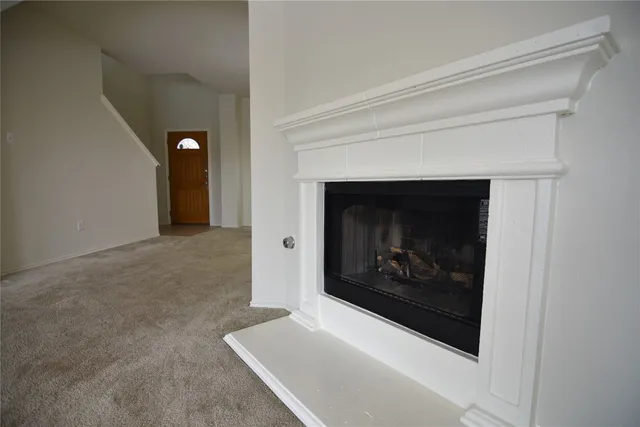 a living room with a fireplace