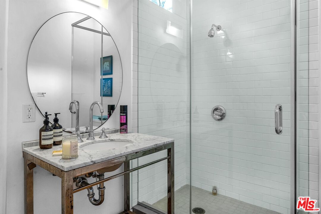 815 Hampton Drive, Unit 5B Venice, CA 90291 - Photo 5 of 20 a bathroom with a sink and a mirror