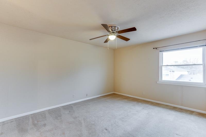 810 Bellevue Road, Unit 242 Nashville, TN 37221 - Photo 12 of 16 an empty room with a window and a fan