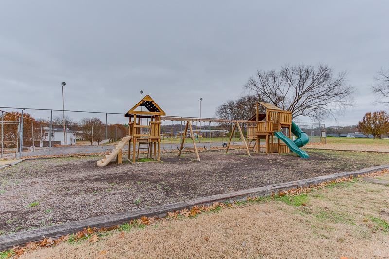 810 Bellevue Road, Unit 242 Nashville, TN 37221 - Photo 16 of 16 a view of outdoor space with playground and green space