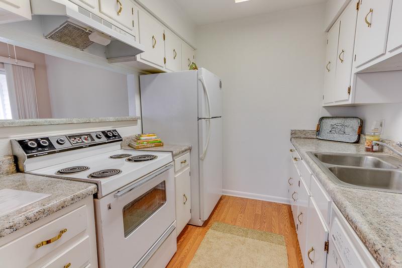 810 Bellevue Road, Unit 242 Nashville, TN 37221 - Photo 8 of 16 a kitchen that has a sink and a stove