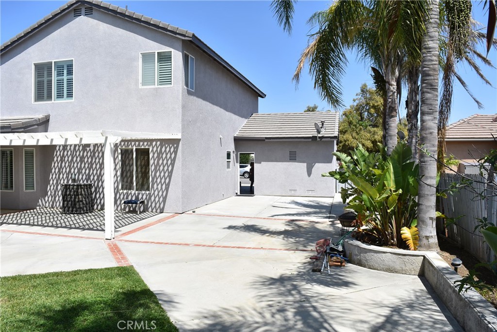 1665 Ravenswood Road Beaumont, CA 92223 - Photo 38 of 41 a view of a house with a yard and furniture