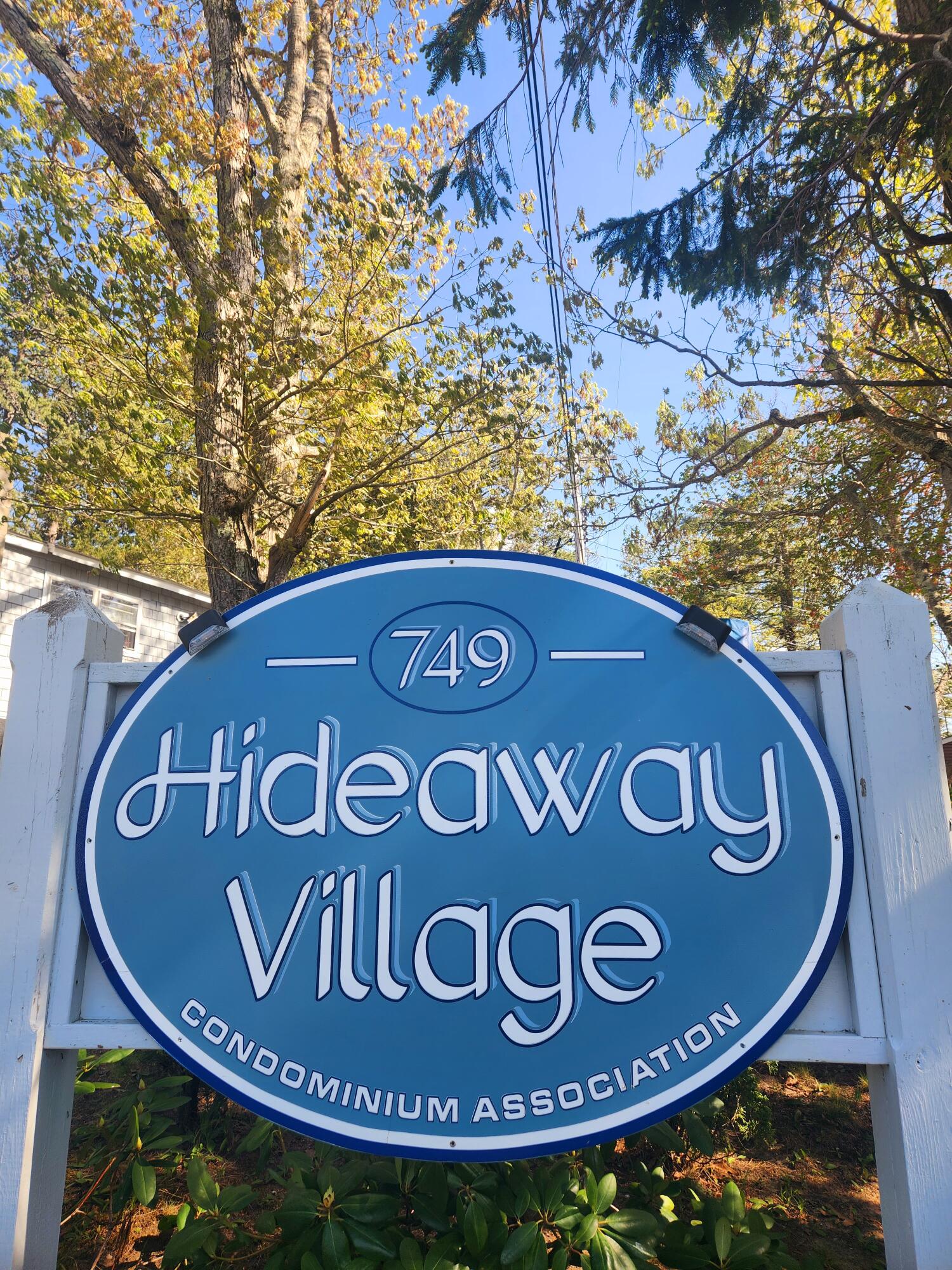 9 Windy Hill Road, Unit D Buzzards Bay, MA 02532 - Photo 2 of 15 a view of a sign board