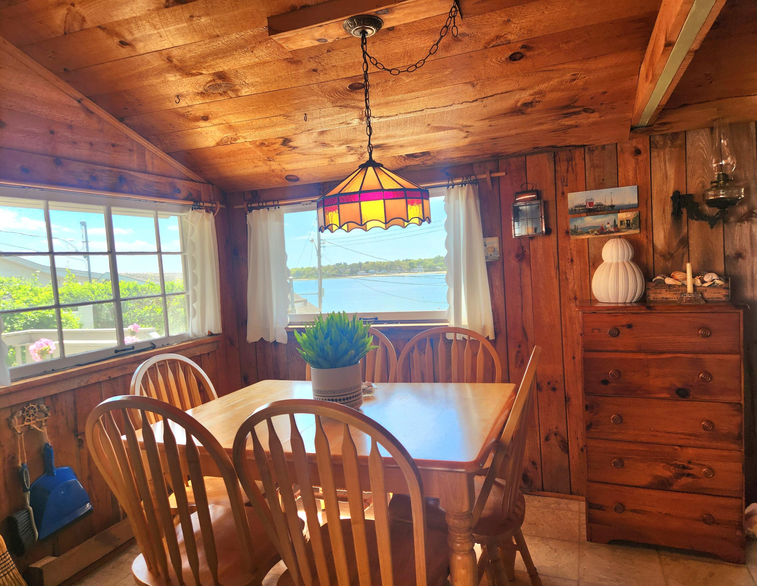 9 Windy Hill Road, Unit D Buzzards Bay, MA 02532 - Photo 8 of 15 a view of a dining room with furniture window and outside view