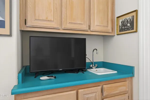 a bedroom with a bed and a table