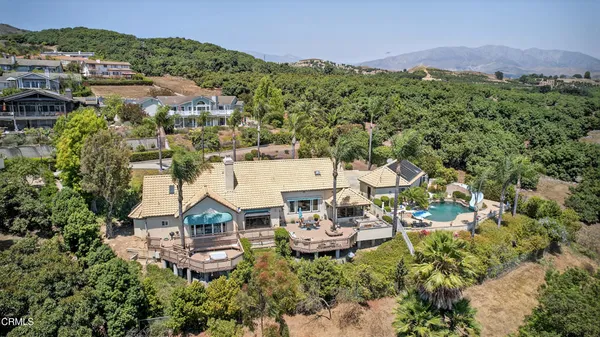 an aerial view of a house with a garden