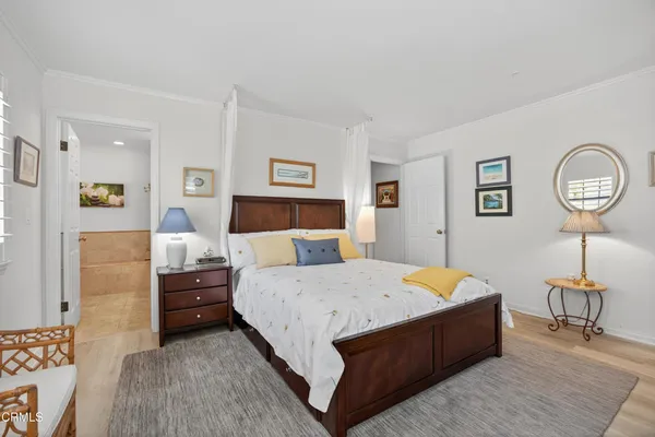 a view of sitting area with furniture and lake view