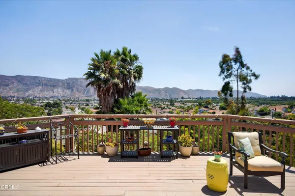 an aerial view of residential house with outdoor space and mountain view