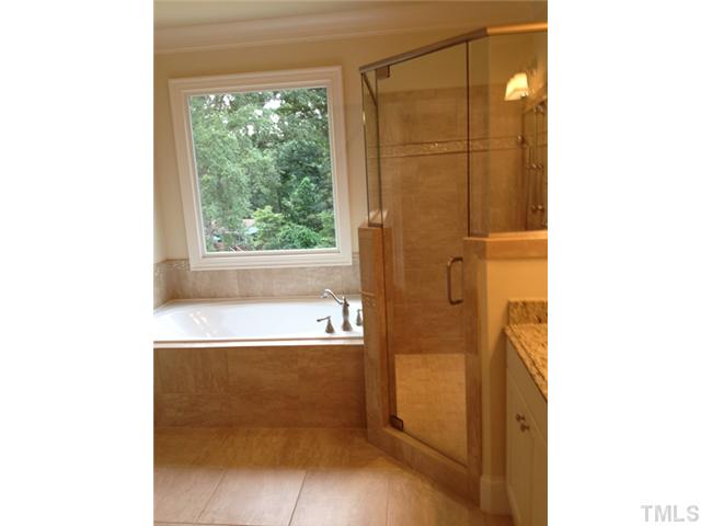824 Lake Boone Trail Raleigh, NC 27607 - Photo 5 of 8 a bathroom with a bathtub and a shower