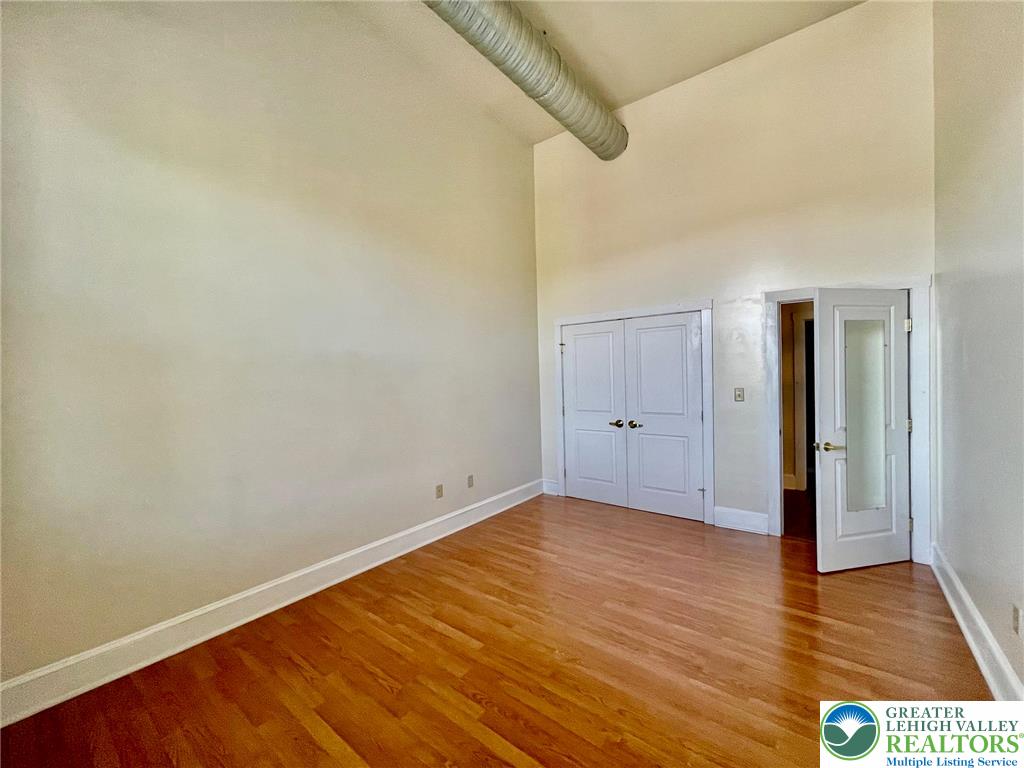 147 South 4th Street, Unit 17 Easton, PA 18042 - Photo 17 of 20 a view of an empty room with wooden floor
