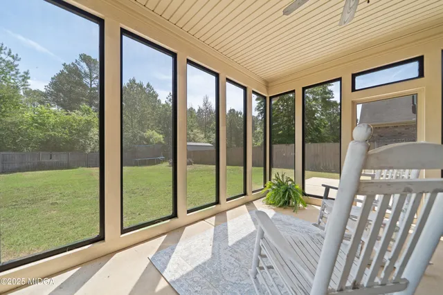 a view of a porch with a big yard