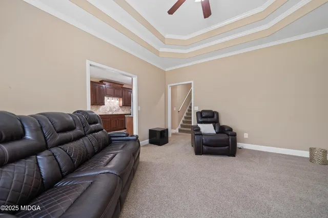 a living room with furniture and a window