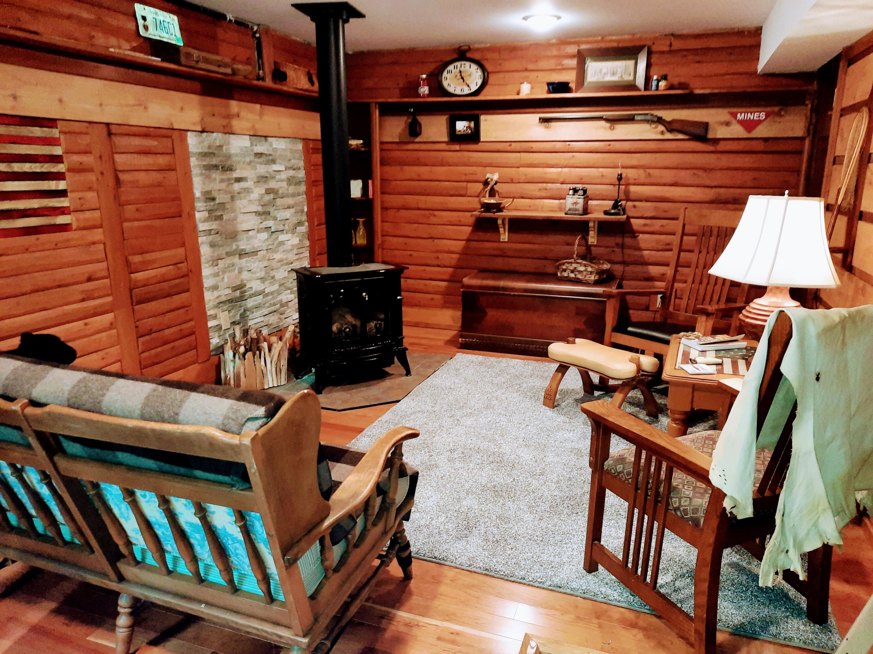 9487 Peters Farm Road Irons, MI 49644 - Photo 2 of 93 Hand-hewn Wood Throughout
