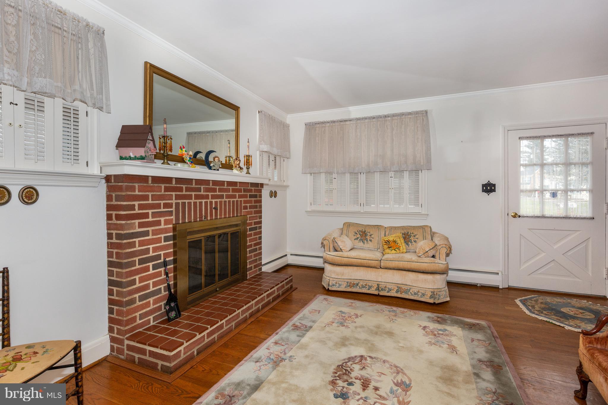24 Byway Road Owings Mills, MD 21117 - Photo 8 of 24 living room fireplace main floor