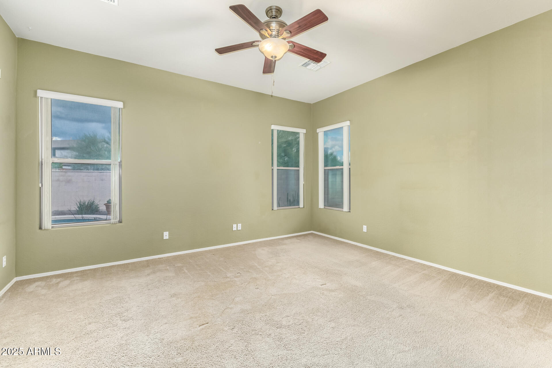 35819 North 33rd Lane Phoenix, AZ 85086 - Photo 19 of 50 a view of an empty room with a window